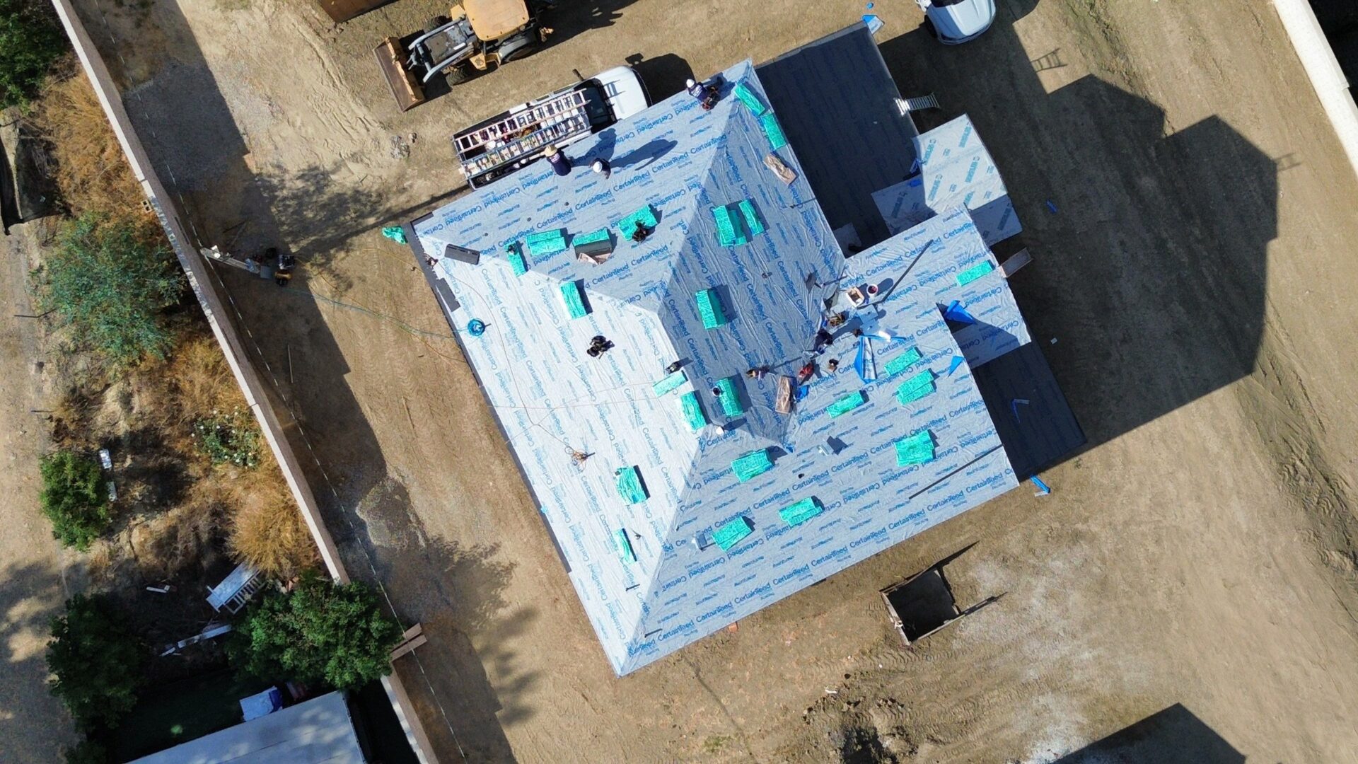 A large roof covered with insulation panels during construction.