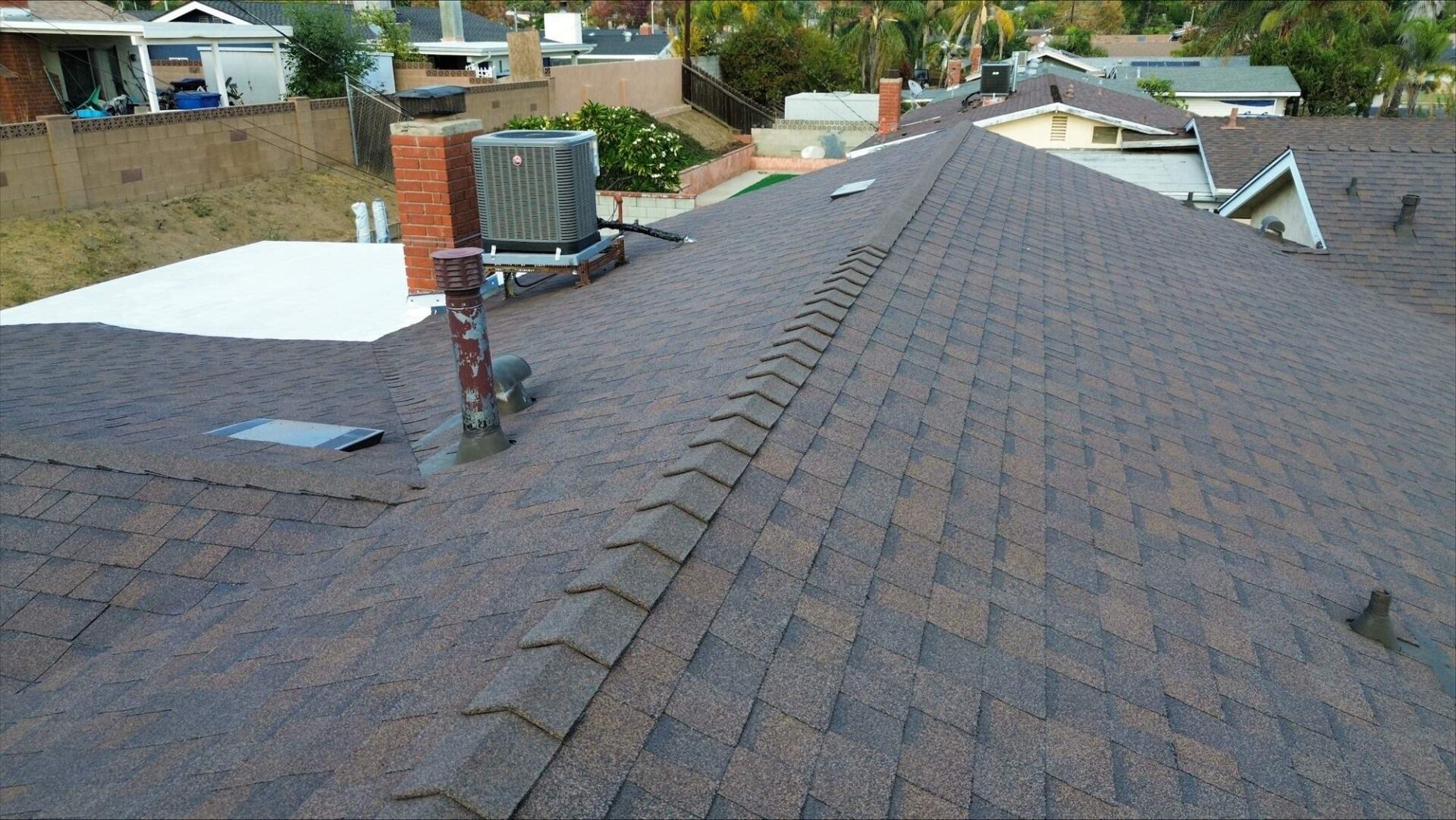 Newly installed roof shingles on a residential home.