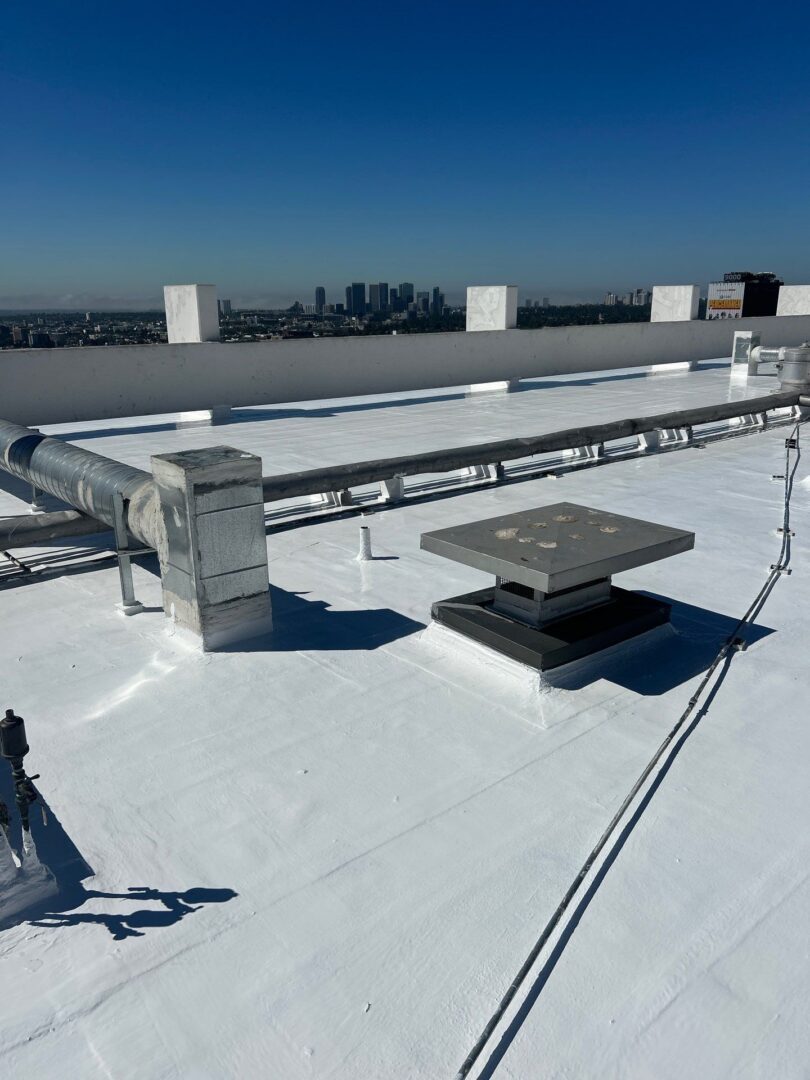 Solar panel mounting structure installed on a flat rooftop.
