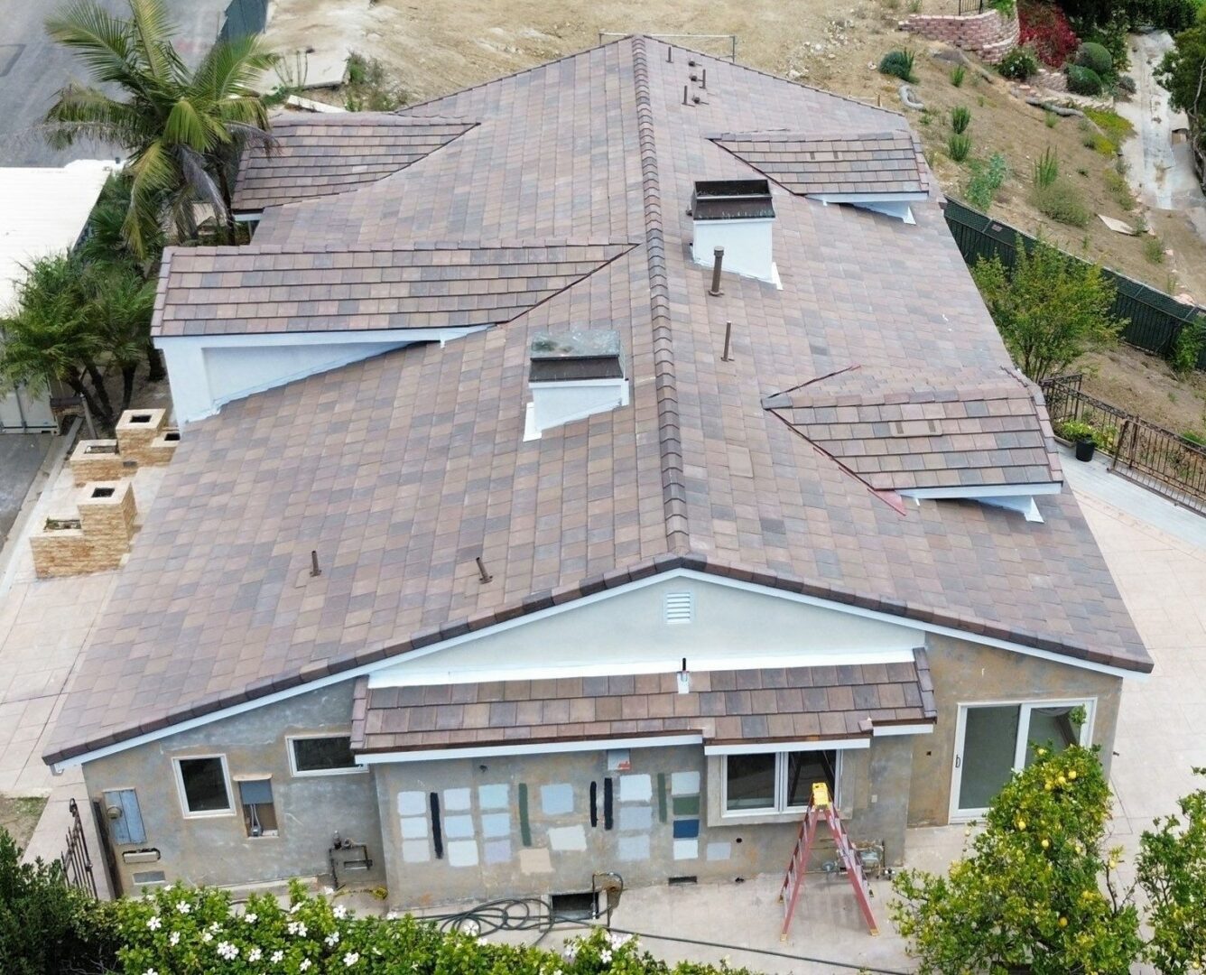 Aerial view of brown tiled residential roof